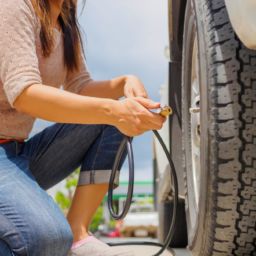 woman filling her tires with air