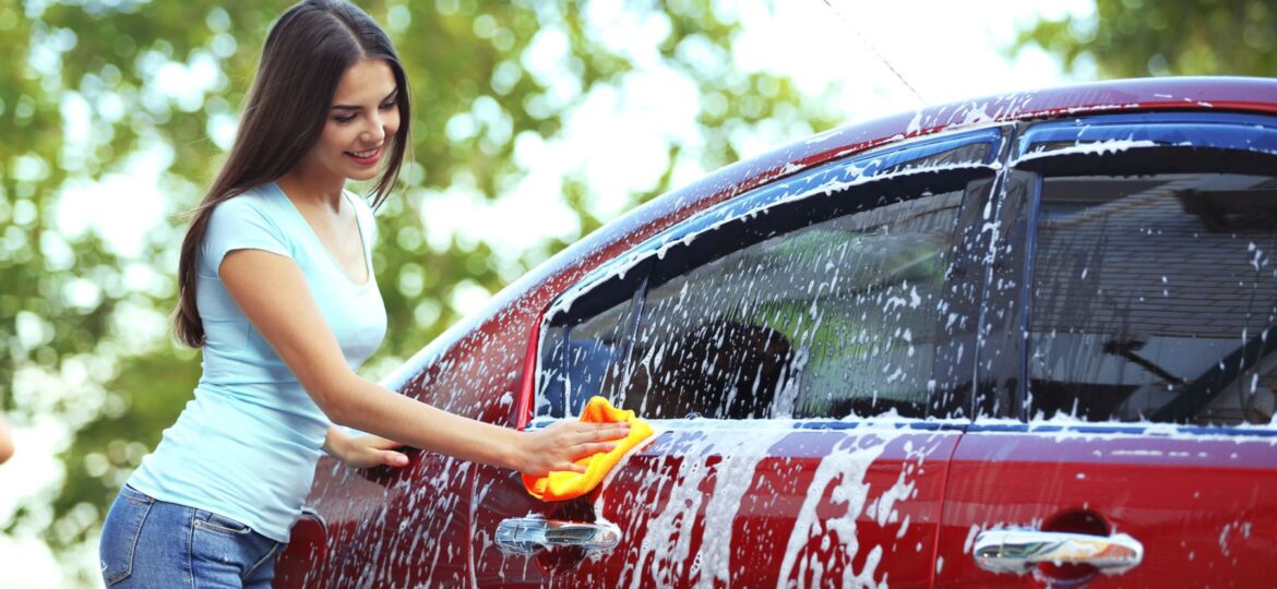 teen washing her car